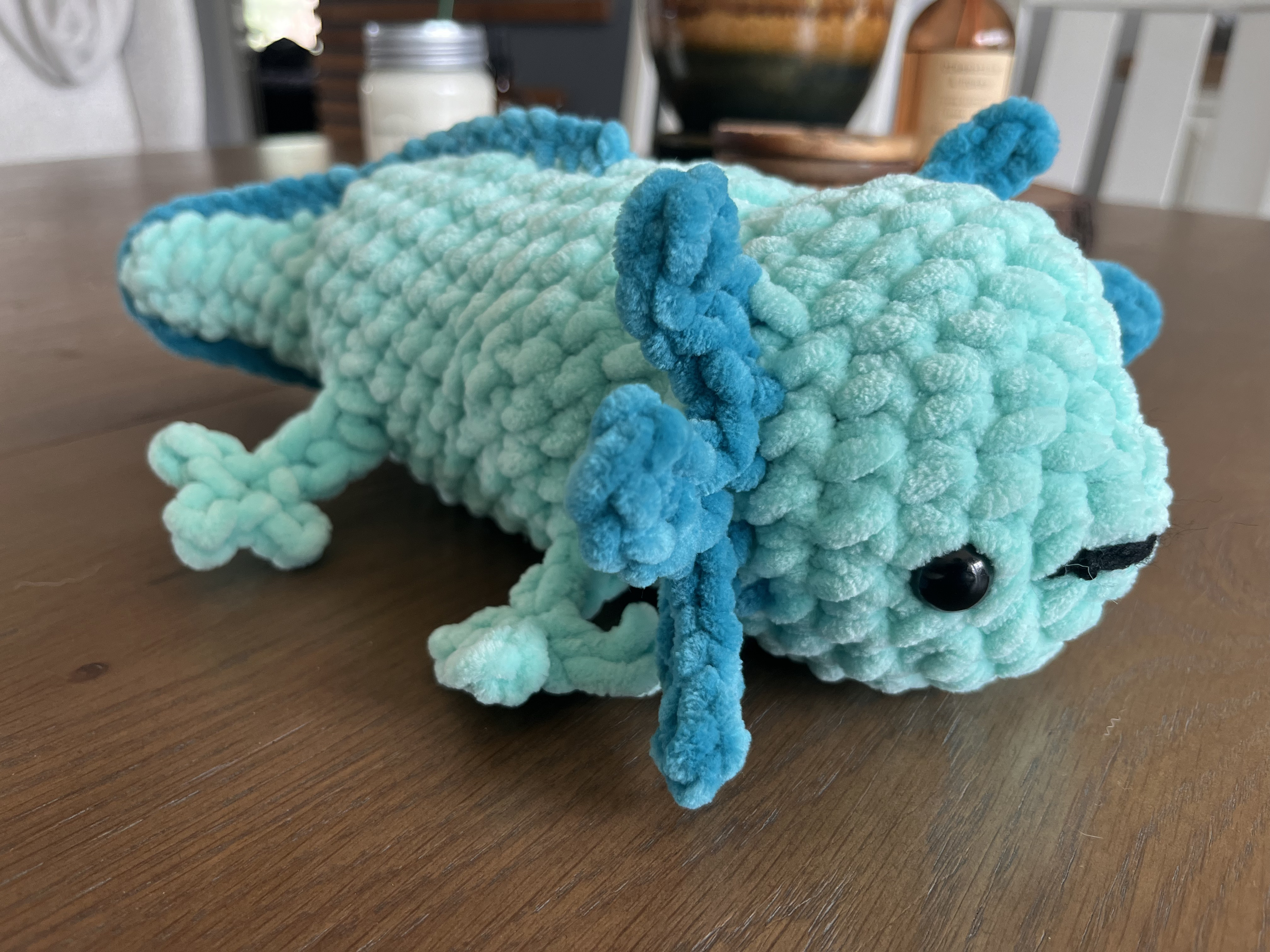 Photo of a blue crocheted axolotl